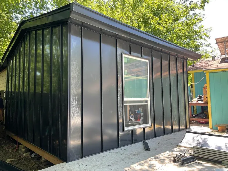 Black standing seam metal wall panels for Metal Roof Installation in Costa Mesa